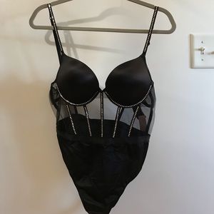 Brand new with tags Victoria’s Secret lingerie one piece. Crystal adorning.
